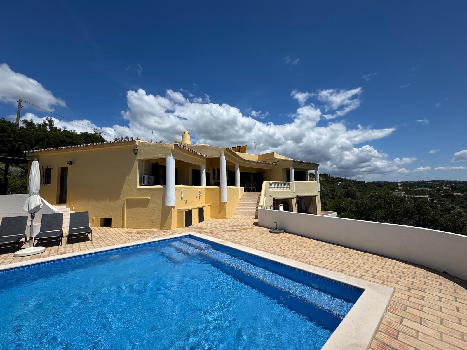 Casa das Rochas exterior and pool